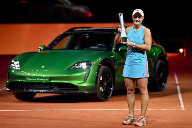 Ashleigh Barty AUS Award ceremony with trophy in front of winning car Porsche Taycan Turbo S Cross Turismo Final Tennis Ladies Porsche Cup Porsche Tennis Grand Prix GP Stuttgart 2021 Porsche Arena 25 04 2021 Porsche Tennis Grand Prix Stuttgart 2021