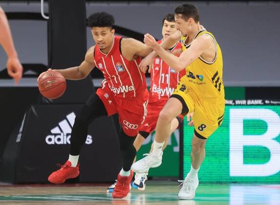 25 04 2021, BBL , FC Bayern Basketball vs Alba Berlin, Audi Dome Muenchen , in picture Jason George FCB Basketball vs Marcus Eriksson Alba Berlin