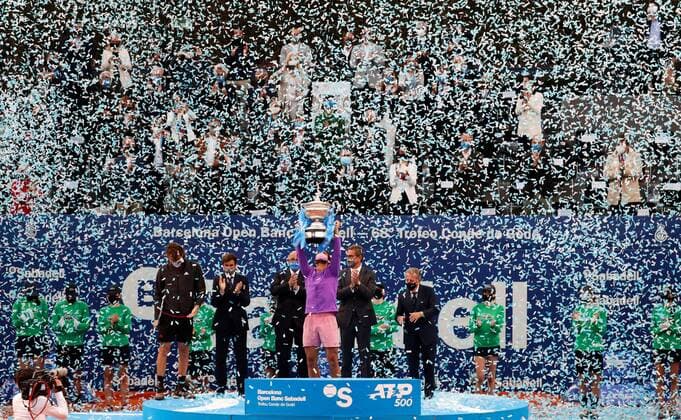 Spanish tennis player Rafa Nadal celebrates with the trophy after defeating Greek tennis player Stefanos Tsitsipas during the Barcelona Open Banc Sabadell - Conde de Godo tournament final game in Barcelona, Spain, 25 April 2021. Rafa Nadal vs Stefanos Tsitsipas !ACHTUNG: NUR REDAKTIONELLE NUTZUNG!  Copyright: xAlejandroxGarcíax GRAF2243 20210425-637549802556301366
