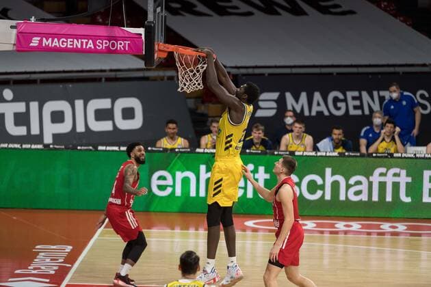 Basketball, BBL, 20210425, FC Bayern Munich Alba Berlin In the picture Christ KOUMADJE Alba Berlin, 21 Dunk Munich Audi Dome Bayern Germany Copyright: Passion2Press MarkusxFischerx