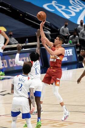 Denver Nuggets forward Michael Porter Jr. 1 (R) goes up for a shot against New Orleans Pelicans guard Kira Lewis Jr. 13 (C), as New Orleans Pelicans guard Lonzo Ball 2 (L), looks on during a NBA, Basketball Herren, USA game, at the Ball Arena in Denver, CO, US, 28 April 2021. New Orleans Pelicans at Denver Nuggets !ACHTUNG: NUR REDAKTIONELLE NUTZUNG!  Copyright: xToddxPiersonx AME3547 20210429-637552659610314139