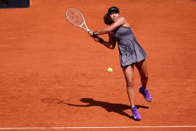 MADRID, SPAIN - APRIL 30: Naomi Osaka of Japan in action in her first round match against Misaki Doi of Japan during day two of the Mutua Madrid Open Tennis at La Caja Magica on April 30, 2021 in Madrid, Spain  Copyright: xxxx