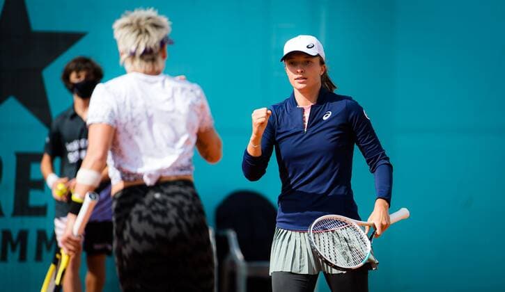 Mandatory Credit: Photo by Rob Prange Shutterstock (11876061cb) Iga Swiatek of Poland & Bethanie Mattek-Sands of the United States playing doubles at the 2021 Mutua Madrid Open WTA, Tennis Damen 1000 tournament Mutua Madrid Open, Tennis, La Caja Magica, Madrid, Spain - 30 Apr 2021 Mutua Madrid Open, Tennis, La Caja Magica, Madrid, Spain - 30 Apr 2021  Copyright: xRobxPrange Shutterstockx 11876061cb