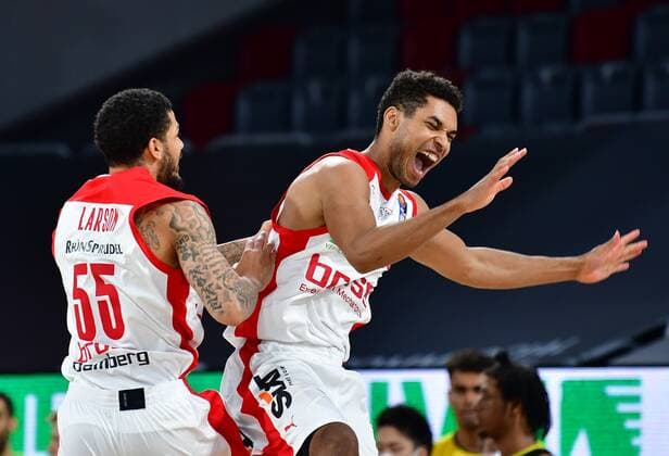 BAMBERG 30 04 2021 Basketball easycredit 1 Basketball Bundesliga 31 matchday Brose Bamberg vs MHP Riesen Luswigsburg Tyler Larson 55, Brose Bamberg and Kenneth Ogbe 25, Brose Bamberg are pleased with successful action Photo Hans Martin Issler isslerimages Brose Bamberg vs MHP Riesen Luswigsburg