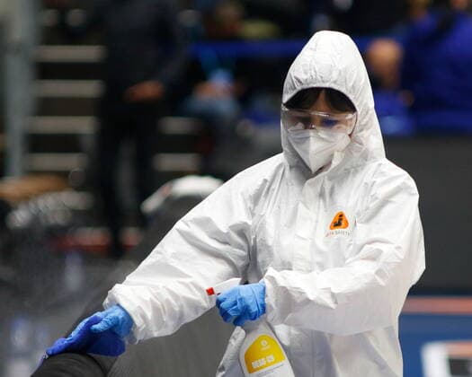 Saint Petersburg, Russia - 30 April 2021: Medical workers on Coronavirus are seen in action during the 2020-2021 Playoffs EuroLeague, match 4 between FC Barcelona, Barca and Zenit. MaksimxKonstantinov