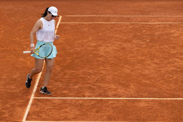 (210501) -- MADRID, May 1, 2021 -- Zheng Saisai of China celebrates during the women s single 1st round match against Magda Linette of Poland at the Madrid Open tennis tournament in Madrid, Spain, April 30, 2021. ) (SP)SPAIN-MADRID-TENNIS-MADRID OPEN MengxDingbo 
