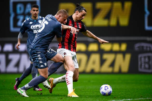 Zlatan Ibrahimovic of AC Milan competes for the ball with Kamil Glik of Benevento Calcio during the Serie A football match between AC Milan and Benevento Calcio. AC Milan won 2-0 over Benevento Calcio. AC Milan v Benevento Calcio - Serie A