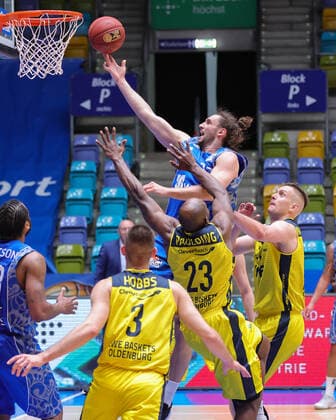 Fraport Skyliners EWE Baskets Oldenburg, easyCredit BBL Marco Voeller Fraport Skyliners, 33 with a basket against Rickey Paulding Oldenburg, 23 Basketball match of the easyCredit BBL between Fraport Skyliners and EWE Baskets Oldenburg on 2 May 2021 at Fraport Arena in Frankfurt am Main , Frankfurt am Main Hessen Germany Fraport Arena