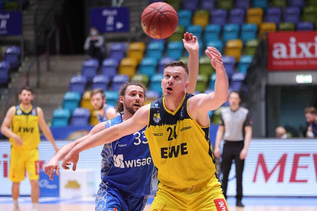 Fraport Skyliners EWE Baskets Oldenburg, easyCredit BBL Rasid Mahalbasic Oldenburg, 24 in front of Marco Voeller Fraport Skyliners, 33 easyCredit BBL basketball match between Fraport Skyliners and EWE Baskets Oldenburg on 2 May 2021 at Fraport Arena in Frankfurt am Main , Frankfurt am Main Hesse Germany Fraport Arena