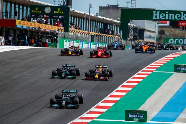 77 BOTTAS Valtteri (fin), Mercedes AMG F1 GP W12 E Performance, action with 44 and 33 VERSTAPPEN Max (nld), Red Bull Racing Honda RB16B, start during the Formula 1 Heineken Grande PrŽmio de Portugal 2021 from April 30 to May 2, 2021 on the Algarve International Circuit, in Portimao, Portugal FORMULE 1 : Grand Prix du Portugal - Course - Portimao - 01 05 2021 DPPI Panoramic  _B2_7158