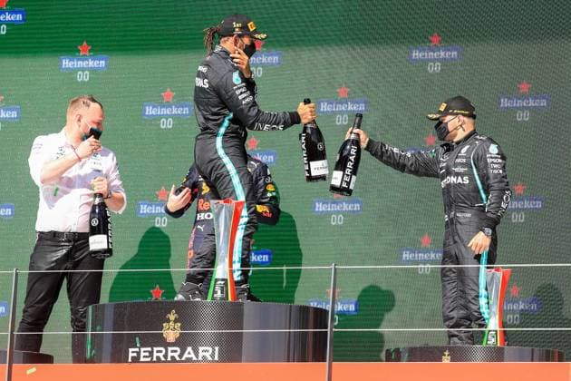 Portuguese Grand Prix, 02 05 2021. Lewis Hamilton (GBR), Mercedes AMG Petronas W12 on podium after victory celebrating with Valtteri Bottas (FIN), Mercedes AMG Petronas W12 champagne during the Formula 1 Heineken Grande Premio De Portugal 2021 at the Algarve International Circuit, Portimao, Portugal on 2 May 2021 Portimao Portugal Editorial use only , Copyright: xPhilxDuncanx PSI-12618-0017