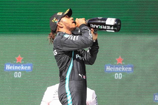 Bilder des Jahres 2021, Sport 05 Mai Sport Themen der Woche KW17 Sport Bilder des Tages Portuguese Grand Prix, 02 05 2021. Lewis Hamilton (GBR), Mercedes AMG Petronas W12 on podium after victory celebrating champagne during the Formula 1 Heineken Grande Premio De Portugal 2021 at the Algarve International Circuit, Portimao, Portugal on 2 May 2021 Portimao Portugal Editorial use only , Copyright: xPhilxDuncanx PSI-12618-0018