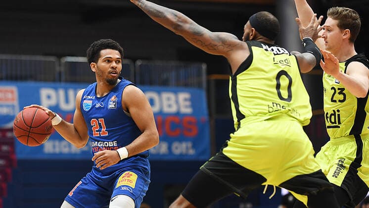 Basketball, 1 Bundesliga, season 2020 2021, 32 matchday, SYNTAINICS MBC Mitteldeutscher Basketball Club Weissenfels vs medi bayreuth 02 05 2021 Quinton Hooker MBC Weissenfels, back number 21 on the ball in front of Dererk Pardon medi Bayreuth, back number 100 and David Walker medi Bayreuth, back number 23 during the game Weißenfels vs Bayreuth 02 05 2021 Weißenfels Sachsen Anhalt Germany Stadthalle Weißenfels
