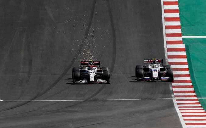 99 GIOVINAZZI Antonio (ita), Alfa Romeo Racing ORLEN C41, action and 47 SCHUMACHER Mick (ger), Haas F1 Team VF-21 Ferrari, action during the Formula 1 Heineken Grande PrŽmio de Portugal 2021 from April 30 to May 2, 2021 on the Algarve International Circuit, in Portimao, Portugal FORMULE 1 : Grand Prix du Portugal - Course - Portimao - 02 05 2021 DPPI Panoramic  00121006_F12021GP03POR_JK081314