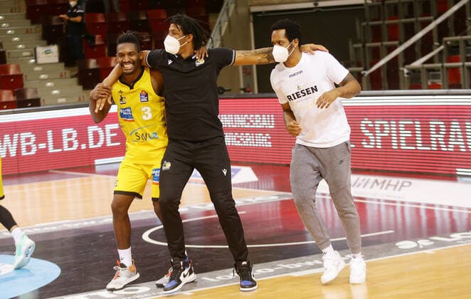 Ludwigsburg , Basketball easyCredit BBL Bundesliga , MHP RIESEN Ludwigsburg vs Telekom Baskets Bonn , cheering Ludwigsburg , from left Jaleen Smith Desi Rodriguez Barry Brown