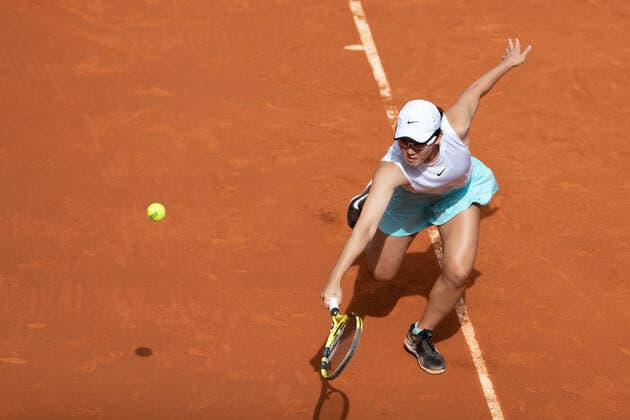 (210503) -- MADRID, May 3, 2021 -- Zheng Saisai of China returns the ball during the women s singles 2nd round match against Simona Halep of Romania at the Madrid Open tennis tournament in Madrid, Spain, May 2, 2021. ) (SP)SPAIN-MADRID-TENNIS-MADRID OPEN MengxDingbo 