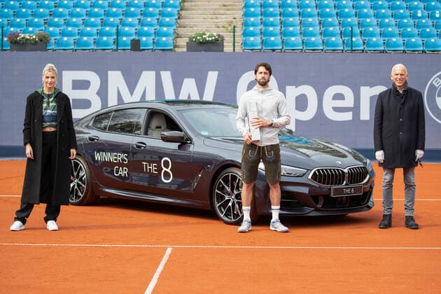 Winner Nikoloz Basilashvili GEO holds the cup, trophy and stands in front of his BMW Mi850, on the right BMW board member Pieter Nota and on the left model Lena Gercke, mens single, award ceremony, presentation Copyright: xJuergenxHasenkopfx