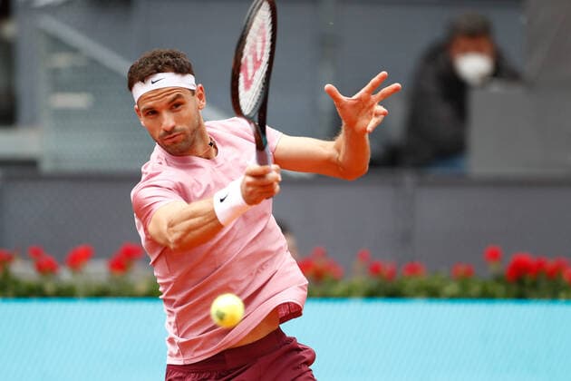 May 3, 2021, MADRID, MADRID, SPAIN: Grigor Dimitrov of Bulgary in action during his Men s Singles match, round of 64, against Lloyd Harris of South Africa on the ATP, Tennis Herren Masters 1000 - Mutua Madrid Open 2021 at La Caja Magica on May 3, 2021 in Madrid, Spain. MADRID SPAIN - ZUMAa181 20210503_zaa_a181_024 Copyright: xOscarxJ.xBarrosox