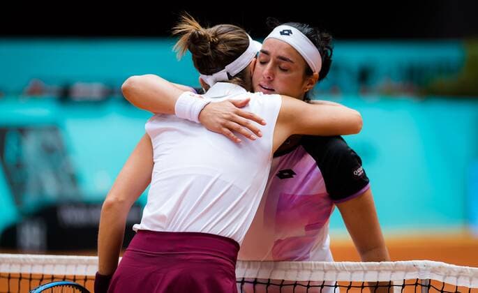 Mandatory Credit: Photo by Rob Prange Shutterstock (11876065bj) Belinda Bencic of Switzerland & Ons Jabeur of Tunisia embrace after Jabeur is forced to retire with injury from the third round of the 2021 Mutua Madrid Open WTA, Tennis Damen 1000 tournament Mutua Madrid Open, Tennis, La Caja Magica, Madrid, Spain - 03 May 2021 Mutua Madrid Open, Tennis, La Caja Magica, Madrid, Spain - 03 May 2021  Copyright: xRobxPrange Shutterstockx 11876065bj