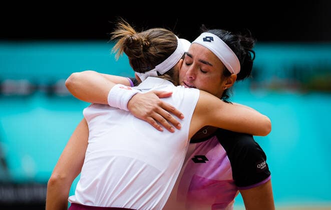 May 3, 2021, MADRID, MADRID, SPAIN: Belinda Bencic of Switzerland & Ons Jabeur of Tunisia embrace after Jabeur is forced to retire with injury from the third round of the 2021 Mutua Madrid Open WTA, Tennis Damen 1000 tournament MADRID SPAIN - ZUMAa181 20210503_zaa_a181_134 Copyright: xRobxPrangex
