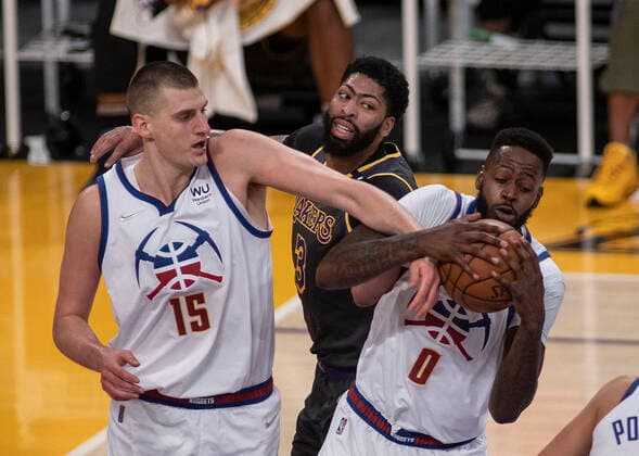 May 3, 2021, Los Angeles, California, USA: Anthony Davis 3 of the Los Angeles Lakers fights for a rebound with Nikola Jokic 15 and JaMychal Green 0 of the Denver Nuggets during their regular season NBA, Basketball Herren, USA game on Monday May 3, 2021 at the Staples Center in Los Angeles, California. Lakers defeat Nuggets, 93-89. PI Los Angeles USA - ZUMAp124 20210503_zaa_p124_010 Copyright: xJAVIERxROJASx