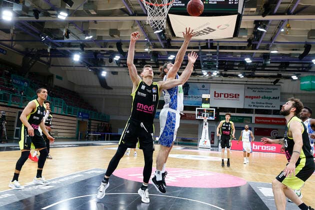 33 Matchday of the easyCredit BBL Basketball Bundesliga on 04 May 2021in the Oberfrankenhalle in Bayreuth Bavaria Germany season 2020 2021 Medi Bayreuth vs Fraport Skyliners Frankfurt Andreas Seiferth Medi Bayreuth 11 left Marco Völler Fraport Skyliners Frankfurt 33 right