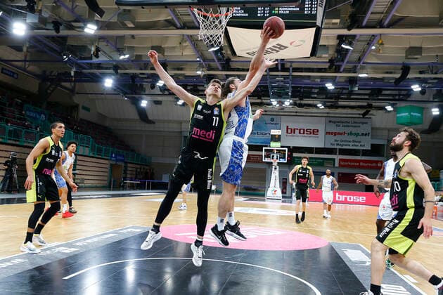33 Matchday of the easyCredit BBL Basketball Bundesliga on 04 May 2021in the Oberfrankenhalle in Bayreuth Bavaria Germany season 2020 2021 Medi Bayreuth vs Fraport Skyliners Frankfurt Andreas Seiferth Medi Bayreuth 11 left Marco Völler Fraport Skyliners Frankfurt 33 right