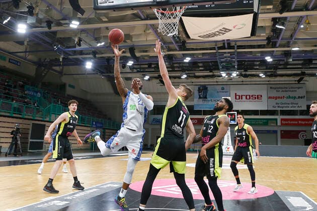 33 Matchday of the easyCredit BBL Basketball Bundesliga on 04 May 2021in the Oberfrankenhalle in Bayreuth Bavaria Germany Season 2020 2021 Medi Bayreuth vs Fraport Skyliners Frankfurt Andreas Seiferth Medi Bayreuth 11 center Kamari Murphy Fraport Skyliners Frankfurt 21 left