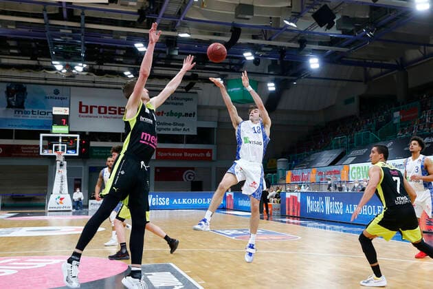 33 Matchday of the easyCredit BBL Basketball Bundesliga on 04 May 2021in the Oberfrankenhalle in Bayreuth Bavaria Germany Season 2020 2021 Medi Bayreuth vs Fraport Skyliners Frankfurt Andreas Seiferth Medi Bayreuth 11 left Joe Rahon Fraport Skyliners Frankfurt 18 right