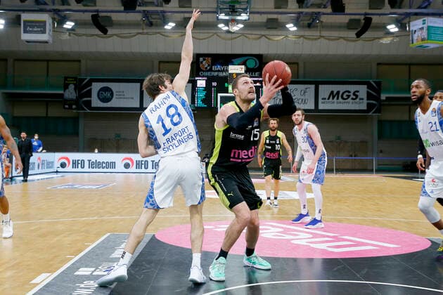33 Matchday of the easyCredit BBL Basketball Bundesliga on 04 May 2021at the Oberfrankenhalle in Bayreuth Bavaria Germany Season 2020 2021 Medi Bayreuth vs Fraport Skyliners Frankfurt Matthew Tiby Medi Bayreuth 15 right Joe Rahon Fraport Skyliners Frankfurt 18 left