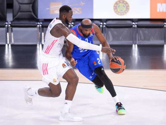 Chris Singleton (2) of Anadolu Efes and Usman Garuba (L) of Real Madrid during the Turkish Airlines Euroleague quarter final 5th match between Anadolu Efes and Real Madrid at Sinan Erdem Dome in Istanbul , Turkey on May 04 , 2021. 