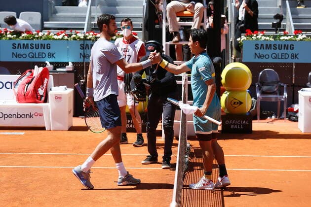 (L-R) Karen Khachanov RUS), Kei Nishikori (JPN), MAY 4, 2021 - Tennis : Kei Nishikori of Japan and Karen Khachanov of Russia after singles 1st round match on the ATP, Tennis Herren Masters 1000 Mutua Madrid Open tennis tournament at the Caja Magica in Madrid, Spain. Noxthirdxpartyxsales  (159618923)