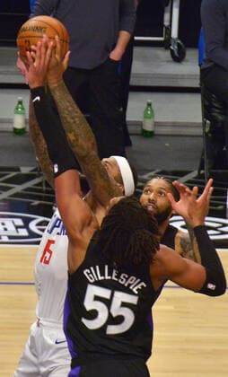 Los Angeles Clippers center DeMarcus Cousins (15) and Toronto Raptors forward Freddie Gillespie (55) battle for control of the rebound during the second half at Staples Center in Los Angeles on Tuesday, May 4, 2021. The Clippers defeated the Raptors 105-100 to end a three-game losing streak.  LAP2021050414 JIMxRUYMEN
