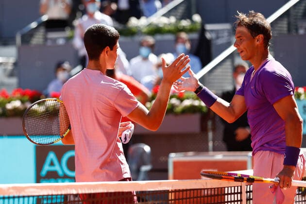 May 5, 2021, MADRID, MADRID, SPAIN: Rafael Nadal of Spain saludates to Carlos Alcaraz of Spain after winning his Men s Singles match, round of 32, on the ATP, Tennis Herren Masters 1000 - Mutua Madrid Open 2021 at La Caja Magica on May 5, 2021 in Madrid, Spain. MADRID SPAIN - ZUMAa181 20210505_zaa_a181_254 Copyright: xOscarxJ.xBarrosox
