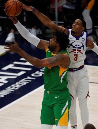 Denver Nuggets guard Shaquille Harrison (3) blocks the shot of Utah Jazz center Derrick Favors (15) during an NBA, Basketball Herren, USA game at the Vivint Smart Home Arena in Salt Lake City, Utah, USA, 07 May 2021. Utah Jazz vs. Denver Nuggets !ACHTUNG: NUR REDAKTIONELLE NUTZUNG!  Copyright: xGEORGExFREYx AME6134 20210508-637560454092624900