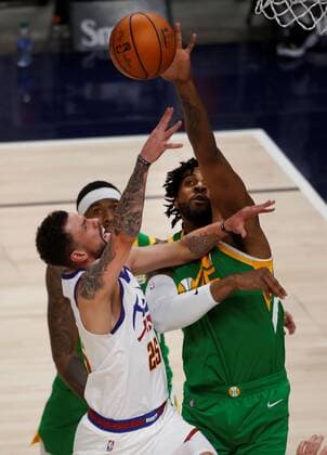 Utah Jazz center Derrick Favors (15) blocks the shot of Denver Nuggets guard Austin Rivers (25) during an NBA, Basketball Herren, USA game at the Vivint Smart Home Arena in Salt Lake City, Utah, USA, 07 May 2021. Utah Jazz vs. Denver Nuggets !ACHTUNG: NUR REDAKTIONELLE NUTZUNG!  Copyright: xGEORGExFREYx AME6133 20210508-637560454100437448