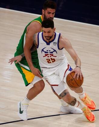 Denver Nuggets guard Austin Rivers (25), is in action against Utah Jazz forward Georges Niang (31), during an NBA, Basketball Herren, USA game at the Vivint Smart Home Arena in Salt Lake City, Utah, USA, 07 May 2021. Utah Jazz vs. Denver Nuggets !ACHTUNG: NUR REDAKTIONELLE NUTZUNG!  Copyright: xGEORGExFREYx AME6145 20210508-637560495473621377