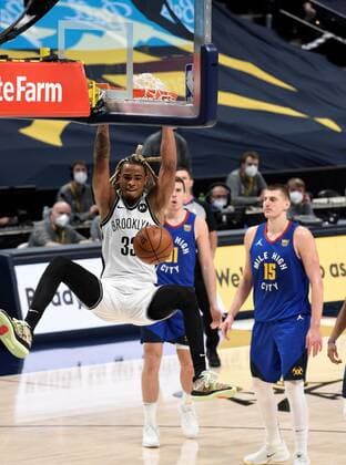 Brooklyn Nets forward Nicolas Claxton 33 (L) dunks the ball as Denver Nuggets forward Vlatko Cancar 31(C) and Denver Nuggets center Nikola Jokic 15 (R), look on during the third quarter at the Ball Arena in Denver, CO, USA, 08 May 2021. Denver Nuggets - Brooklyn Nets !ACHTUNG: NUR REDAKTIONELLE NUTZUNG!  Copyright: xToddxPiersonx AME6336 20210509-637561385572609340
