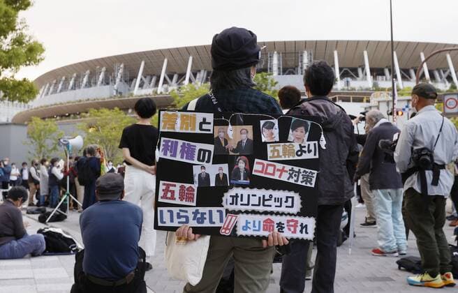 Protest against Tokyo Olympics People protest against holding the Tokyo Olympics amid the coronavirus pandemic, near National Stadium in Tokyo on May 9, 2021, as an Olympic test event for athletics is held inside the venue. 
