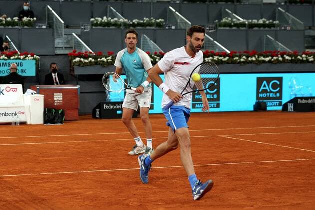 Marcel Granollers of Spain (R) and Horacio Zeballos (L) of Argentina in action during the men s double final against Mate Pavic and Nikola Mektic of Croatia at the Mutua Madrid Open tennis tou?rnament in Madrid, Spain, 09 May 2021. Mutua Madrid Open tennis tou?rnament !ACHTUNG: NUR REDAKTIONELLE NUTZUNG!  Copyright: xChemaxMoyax GRAF3294 20210509-637561741970079340
