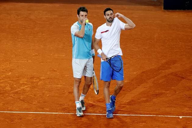 Marcel Granollers of Spain (R) and Horacio Zeballos (L) of Argentina in action during the men s double final against Mate Pavic and Nikola Mektic of Croatia at the Mutua Madrid Open tennis tou?rnament in Madrid, Spain, 09 May 2021. Mutua Madrid Open tennis tou?rnament !ACHTUNG: NUR REDAKTIONELLE NUTZUNG!  Copyright: xChemaxMoyax GRAF3259 20210509-637561754668066276