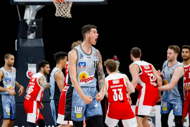 Cheers 15 Bogdan Radosavljevic HAKRO Merlins Crailsheim after three-pointer to 68 75 Brose Bamberg HAKRO Merlins Crailsheim easyCredit BBL Basketball Bundesliga Basketball Season 2020 21 34 Matchday, 09 05 2021 Bamberg, Brose Arena Copyright: DanielxLöb