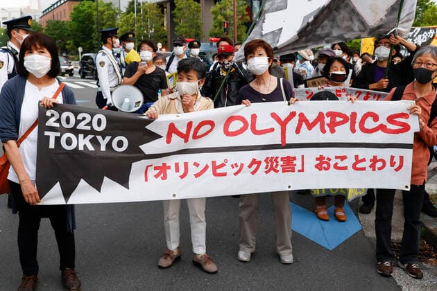 May 9, 2021, Tokyo, Japan: People holding placards against the Tokyo 2020 Olympic Games, Olympische Spiele, Olympia, OS rally around the Japan National Stadium. A group of Anti-Olympics rallied around the Japan National Stadium, asking to cancel Tokyo Olympics to protect people s lives from the spread of new coronavirus infections in the nation. Tokyo Japan - ZUMAm191 0117337478st Copyright: xRodrigoxReyesxMarinx