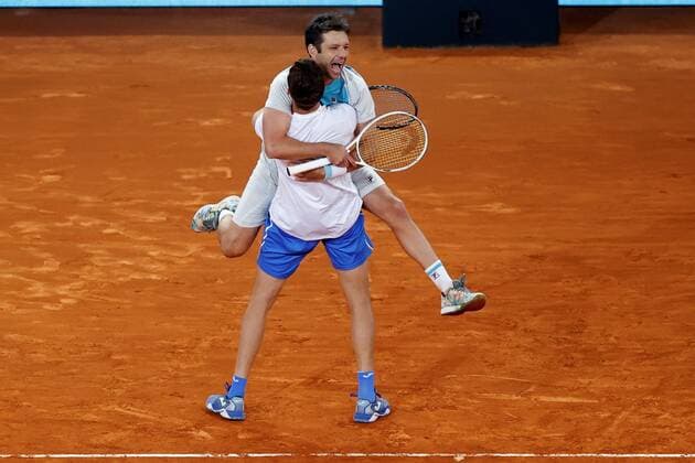 Marcel Granollers of Spain (L) and Horacio Zeballos (R) of Argentina celebrates after winning the men s double final against Mate Pavic and Nikola Mektic of Croatia at the Mutua Madrid Open tennis tou?rnament in Madrid, Spain, 09 May 2021. Mutua Madrid Open tennis tou?rnament !ACHTUNG: NUR REDAKTIONELLE NUTZUNG!  Copyright: xChemaxMoyax GRAF3322 20210509-637561765136191250