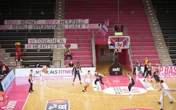 Empty stands with posters of the fans 100 Herzblut Heartberg at the game Telekom Baskets Bonn vs ratiopharm Ulm easyCredit BBL 1 Bundesliga , season 2020 2021 , 34 matchday.