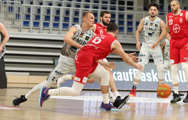 Niklas Wuerzner 2, MLP Academics Heidelberg defending against Luca Kahl 15, Bayer GIANTS Leverkusen during the 2 final game in the BARMER 2 Basketball Bundesliga Pro A, MLP Academics Heidelberg Bayer Giants Leverkusen Heidelberg 09 05 21 Basketball , 09 05 2021, Heidelberg Germany xpxlax