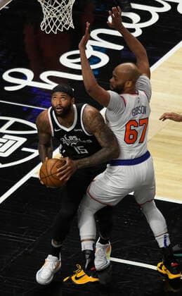 LOS ANGELES, CA - MAY 09: DeMarcus Cousins (15) of the LA Clippers gets past Taj Gibson (67) of the New York Knicks in the first half during the Los Angeles Clippers versus New York Knicks at on May 9, 2021, at Staples Center in Los Angeles, CA. (Photo by John McCoy Icon Sportswire) NBA, Basketball Herren, USA MAY 09 Knicks at Clippers Icon210509003