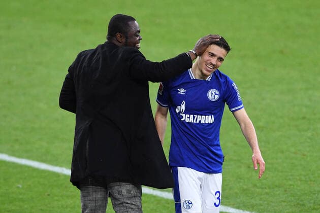 Football 1 Bundesliga 33 Spieltag FC Schalke 04 Eintracht Frankfurt on 15 05 2021 in the Veltins Arena in Gelsenkirchen Goal celebration to 2 2 by Blendi Idrizi Schalke Gerald Asamoah Coordinator Licensed Player Department Schalke , left Blendi Idrizi Schalke , right DFL regulations prohibit any use of photographs as image sequences and or quasi video xHDx