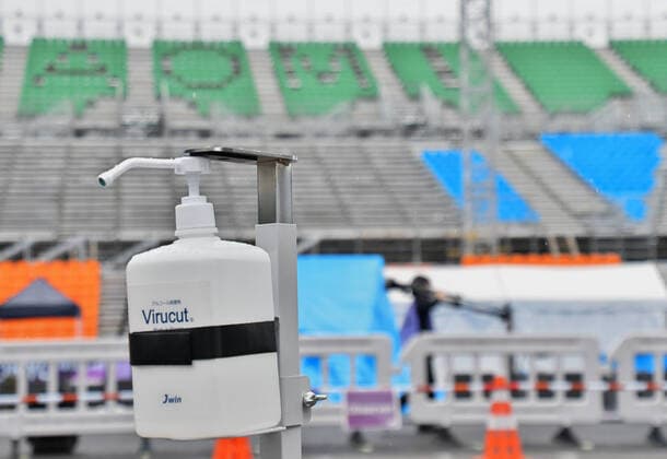 A hand sanitizer is seen set during the Tokyo 2020 Olympics 3x3 basketball test event READY STEADY TOKYO at Aomi Urban Sports Park in Tokyo, Japan on Sunday, May 16, 2021.  TKP2021051615 KEIZOxMORI