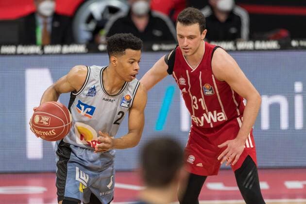 Basketball, BBL, 20210519, FC Bayern Munich Merlins Crailsheim Pictured Trae BELL HAYNES Merlins Crailsheim, 2 dribbling ball and Zan Mark SISKO FC Bayern Munich, 31 Munich Audi Dome Bayern Germany Copyright: Passion2Press MarkusxFischerx